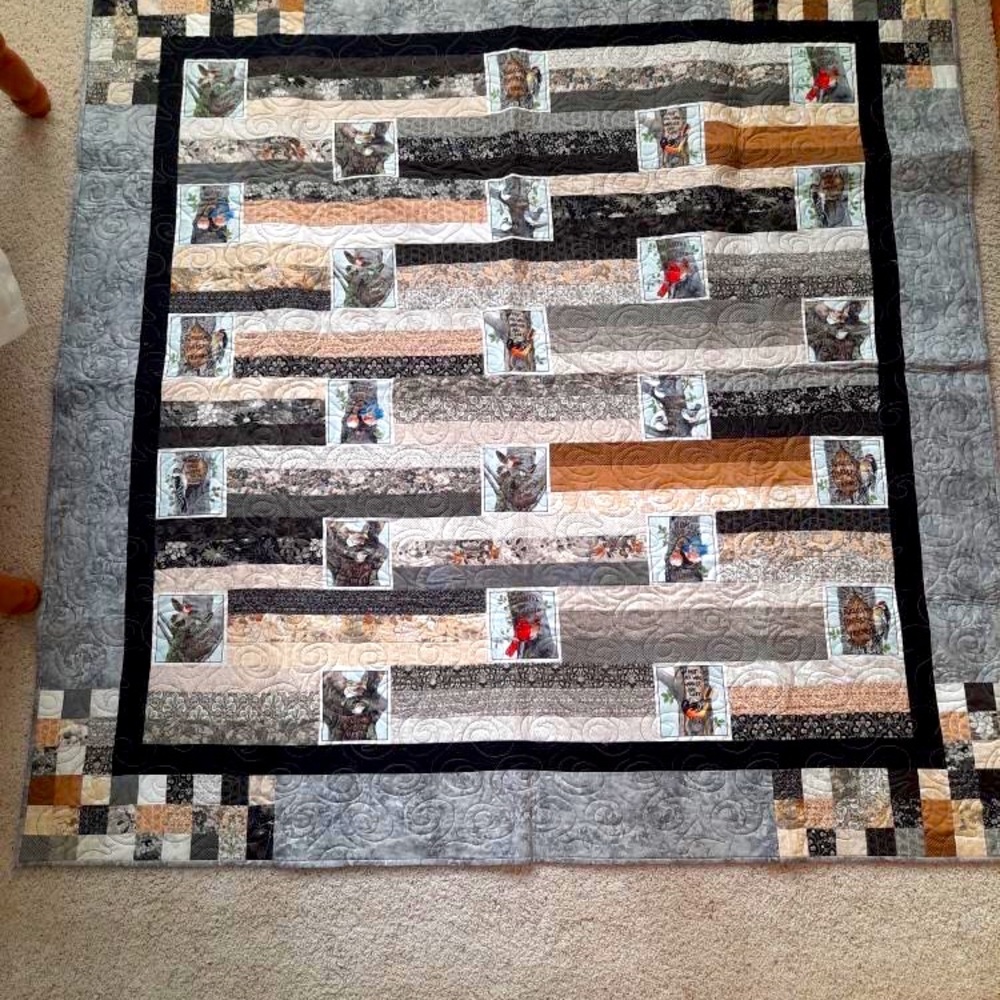 Handmade quilt. 70.5x70.5 black tan and grey. Forrest friends
